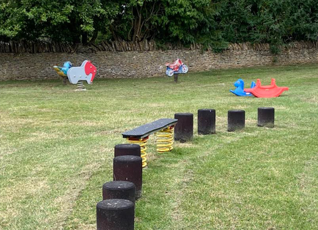 Children's playground balance stumps and rockers